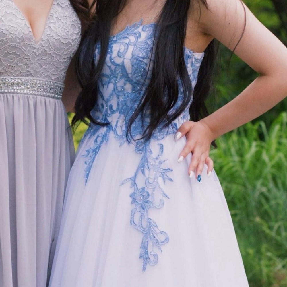 White with blue floral rhinestones appliqué ball gown